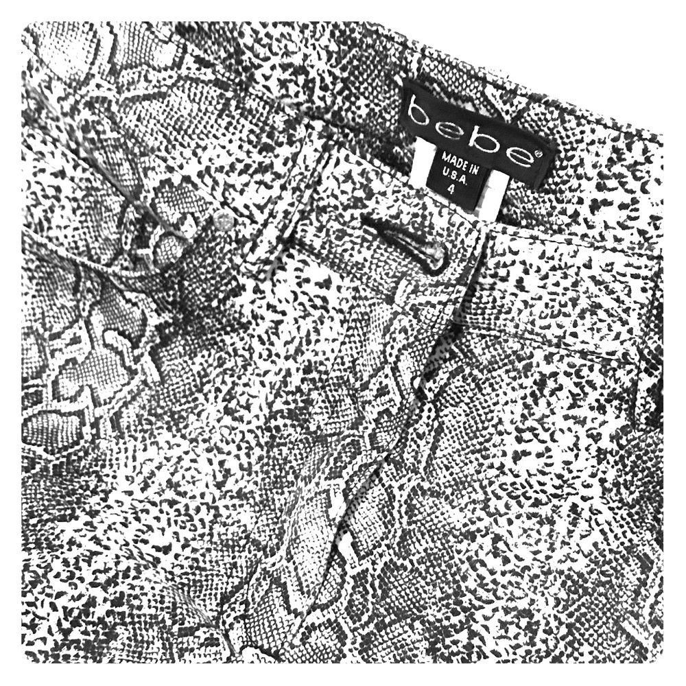 BEBE flared python print  pant size 4